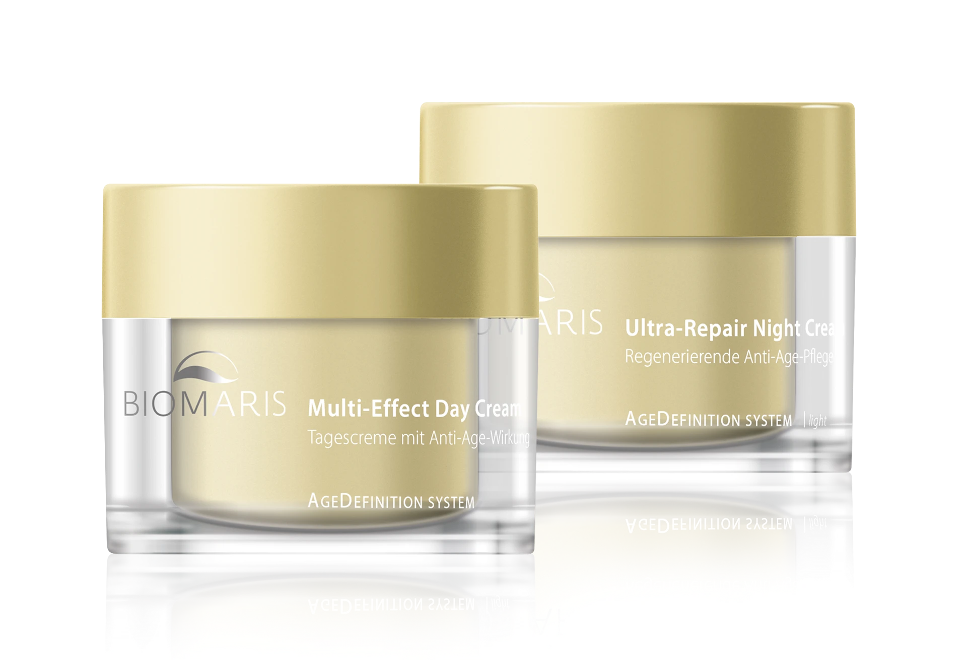  Zwei AgeDefinition System Cremes: Multi-Effect Day Cream und Ultra-Repair Night Cream light nebeneinander.